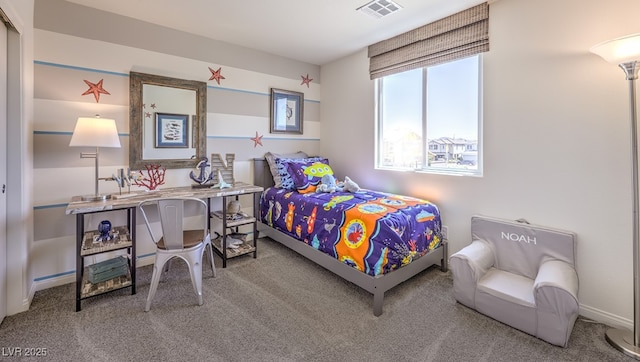 bedroom with carpet flooring, visible vents, and baseboards