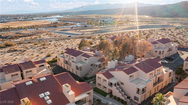 birds eye view of property with a residential view and a mountain view