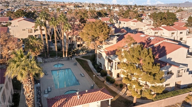 birds eye view of property with a residential view