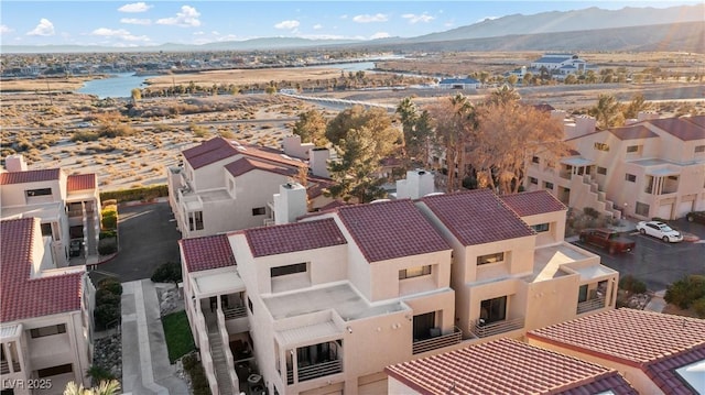 birds eye view of property featuring a residential view and a mountain view