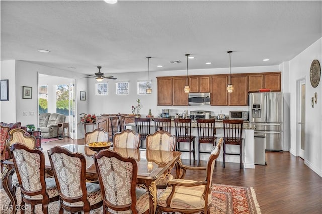 dining room featuring a toaster, recessed lighting, a ceiling fan, baseboards, and dark wood finished floors