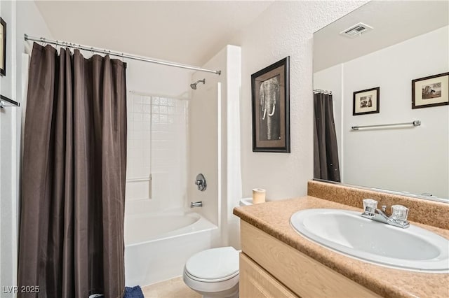 bathroom featuring toilet, shower / bath combo, visible vents, and vanity