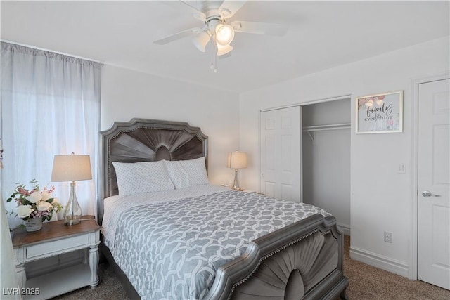 bedroom with a ceiling fan, baseboards, dark carpet, and a closet