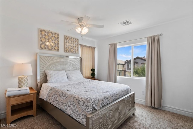 carpeted bedroom featuring visible vents, ceiling fan, and baseboards
