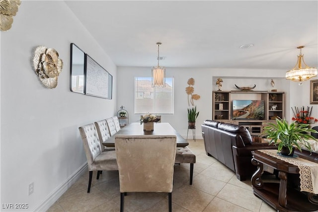 dining room with visible vents, baseboards, and light tile patterned floors
