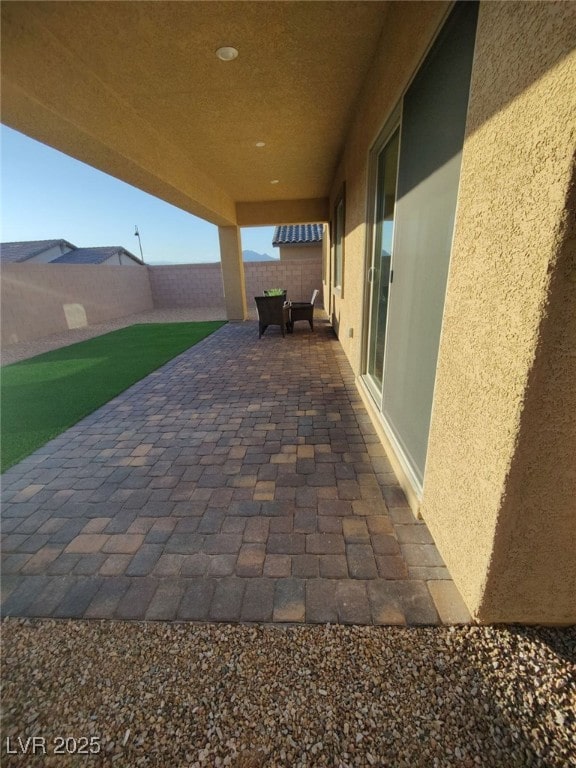 view of patio with a fenced backyard