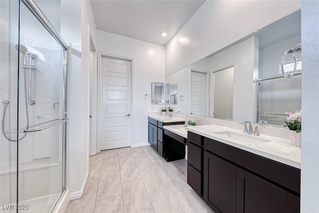 full bathroom featuring a stall shower and vanity