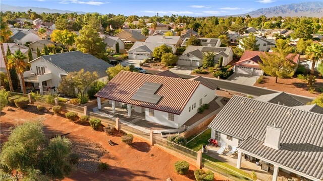 birds eye view of property with a residential view