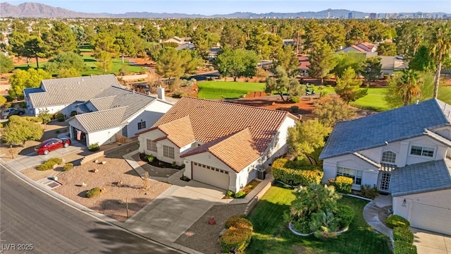 aerial view featuring a residential view and a mountain view