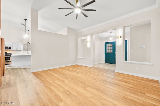 unfurnished living room featuring light wood-type flooring, ceiling fan, baseboards, and ornamental molding