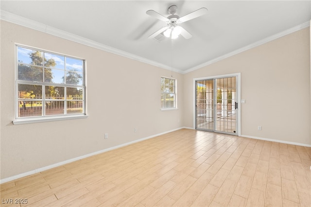 unfurnished room with crown molding, lofted ceiling, ceiling fan, light wood-type flooring, and baseboards