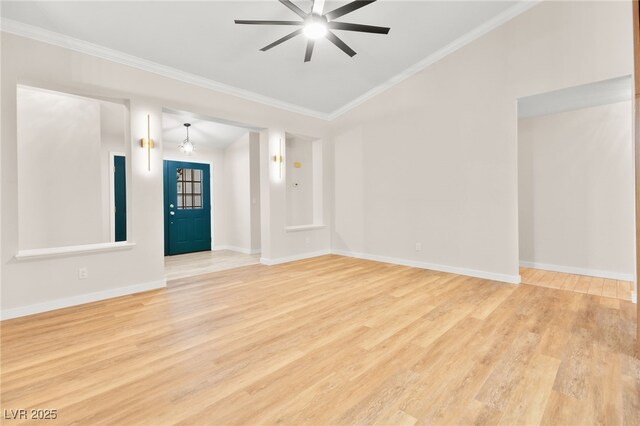 spare room with baseboards, crown molding, light wood finished floors, and ceiling fan