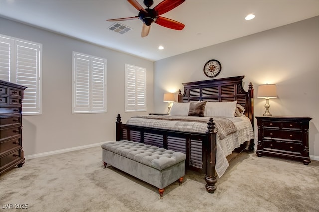 bedroom featuring light carpet, recessed lighting, visible vents, and baseboards