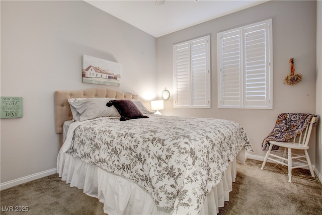 bedroom with carpet and baseboards