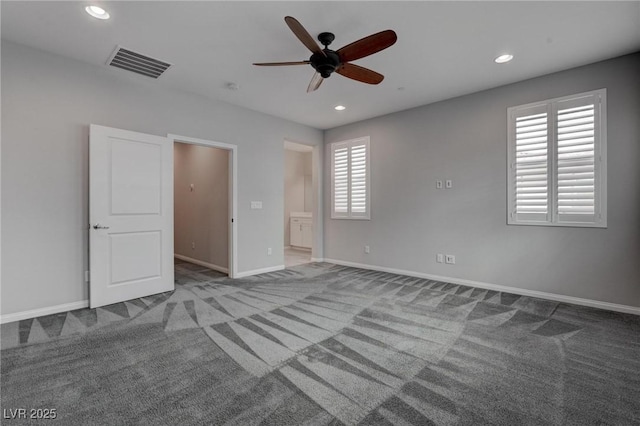 unfurnished bedroom with carpet, visible vents, and recessed lighting
