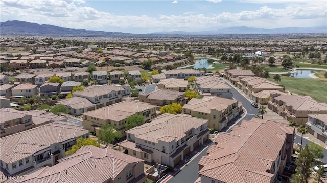 bird's eye view featuring a water and mountain view and a residential view