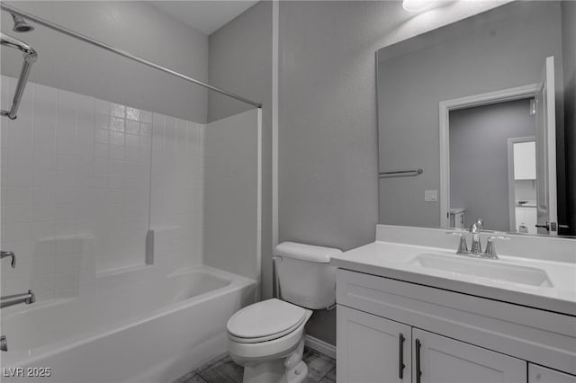 full bath with bathing tub / shower combination, toilet, baseboards, and vanity