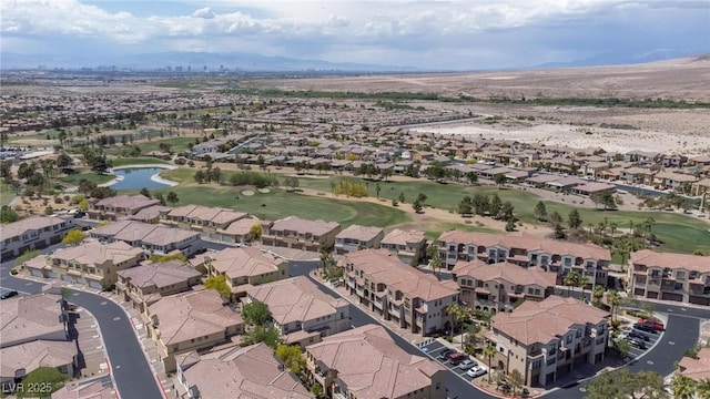 aerial view featuring a water view, golf course view, and a residential view