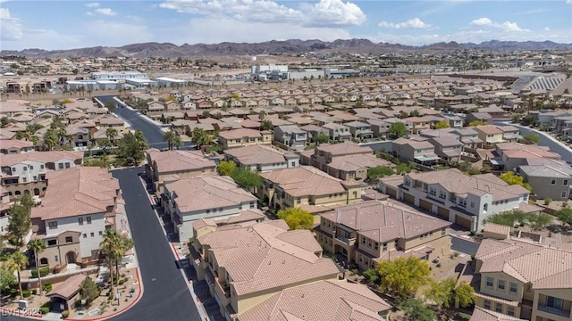 aerial view featuring a residential view and a mountain view