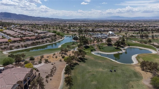 aerial view featuring a water and mountain view, golf course view, and a residential view