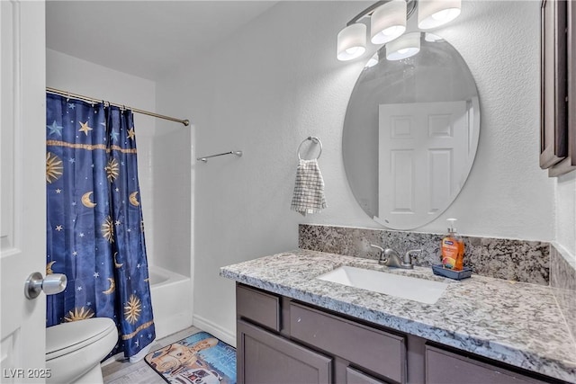 full bathroom with toilet, shower / bath combo with shower curtain, and vanity