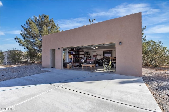 garage featuring fence