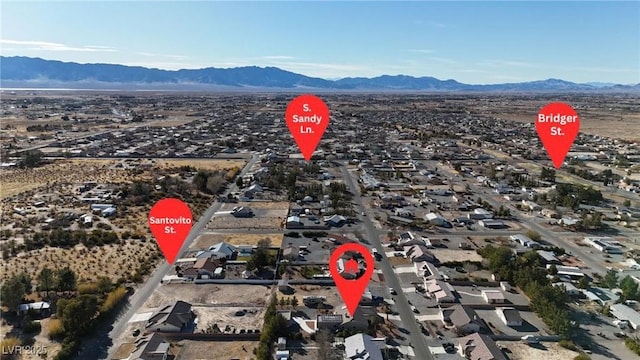 bird's eye view featuring a residential view and a mountain view