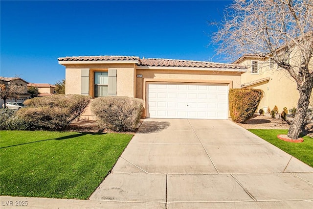 mediterranean / spanish house featuring a garage, a tile roof, driveway, stucco siding, and a front lawn