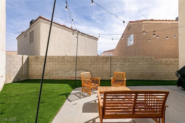 view of patio / terrace with a fenced backyard