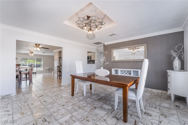 dining room with marble finish floor, baseboards, visible vents, and ornamental molding