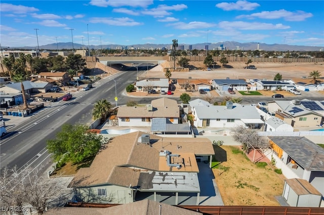 bird's eye view with a residential view and a mountain view