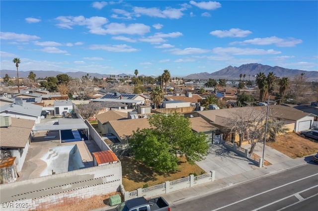 bird's eye view with a residential view and a mountain view