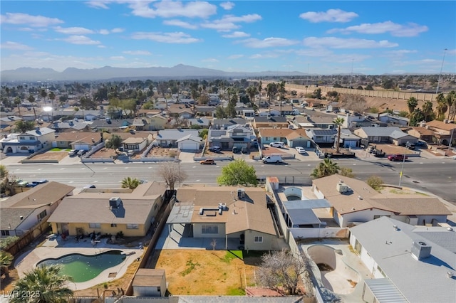 aerial view featuring a mountain view and a residential view