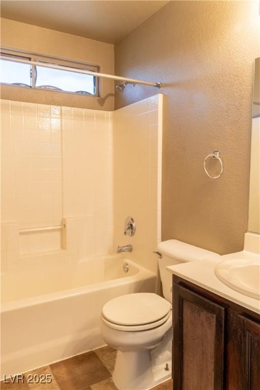 bathroom with  shower combination, vanity, and toilet