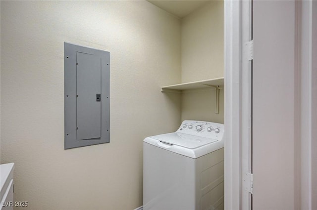 washroom with laundry area, electric panel, and washer / clothes dryer