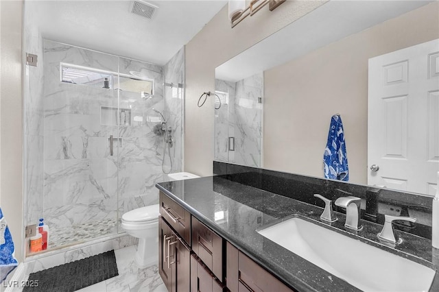 full bath with a marble finish shower, visible vents, toilet, marble finish floor, and vanity