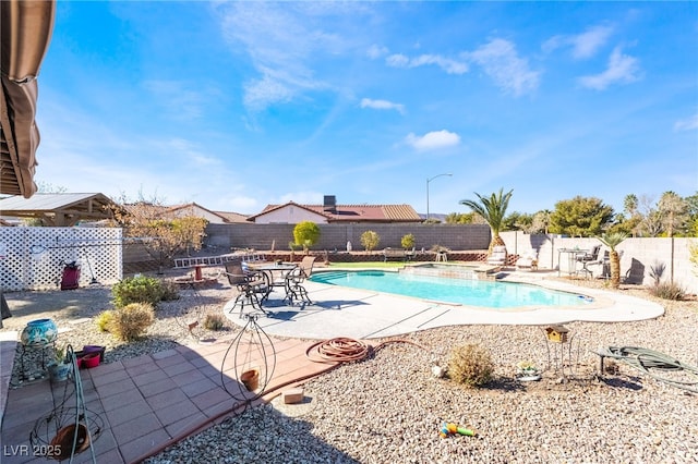 view of swimming pool with a patio area, a fenced backyard, and a fenced in pool