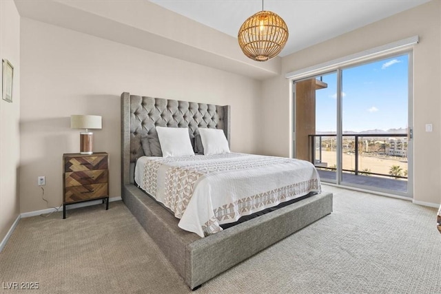 bedroom featuring baseboards, carpet, and access to exterior