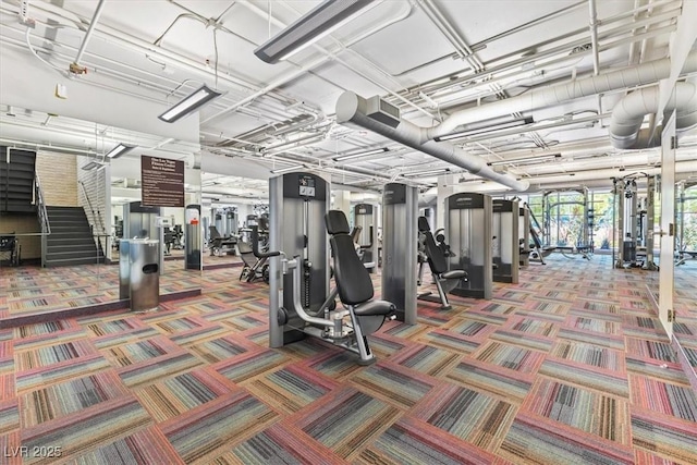 workout area featuring carpet