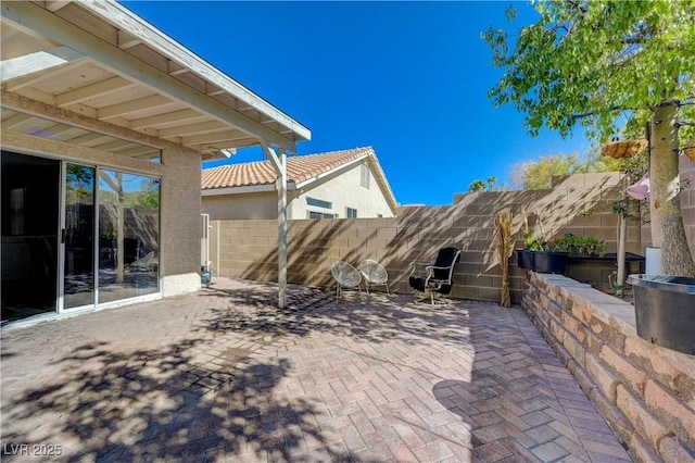 view of patio featuring a fenced backyard