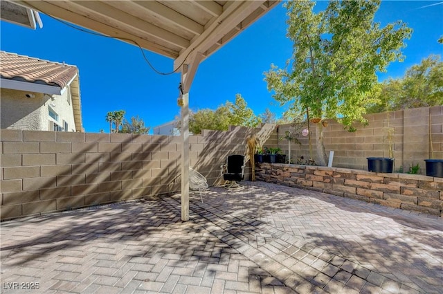 view of patio with a fenced backyard