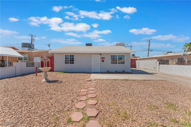 1817 Allen Ave, Henderson, NV 89011 - ranch-style home with stucco siding, a gate, fence, and central AC