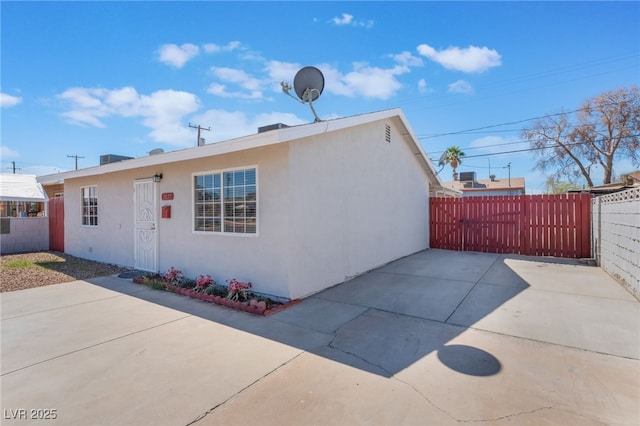 1817 Allen Ave, Henderson, NV 89011 - view of front of house featuring fence, stucco siding, and a patio