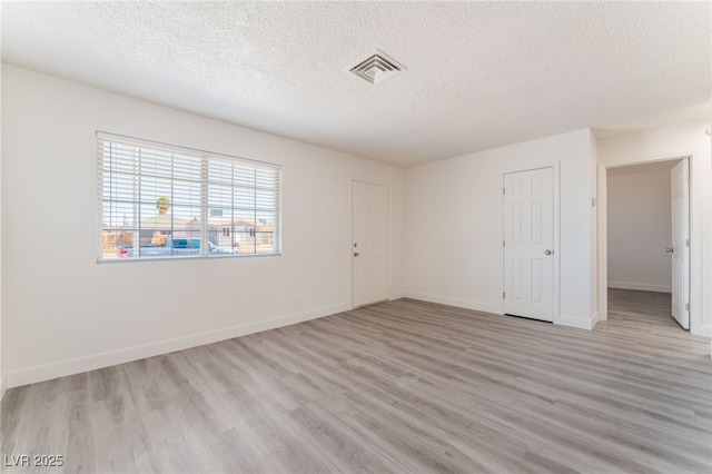 1817 Allen Ave, Henderson, NV 89011 - spare room with light wood-style flooring, baseboards, and visible vents