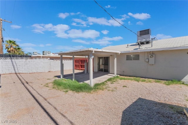 1817 Allen Ave, Henderson, NV 89011 - rear view of house featuring cooling unit, stucco siding, fence, and a patio