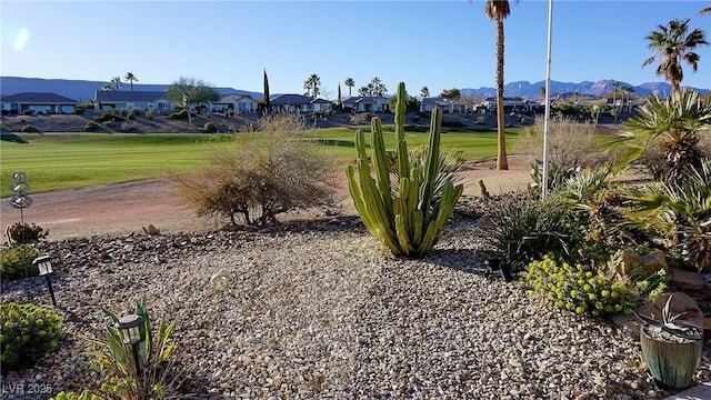 view of community with a residential view and a mountain view