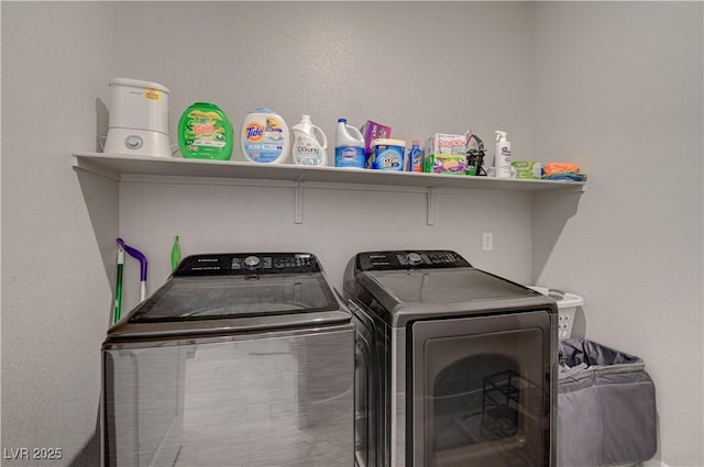 laundry room featuring laundry area and washer and clothes dryer