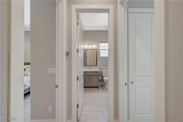 hallway with a sink