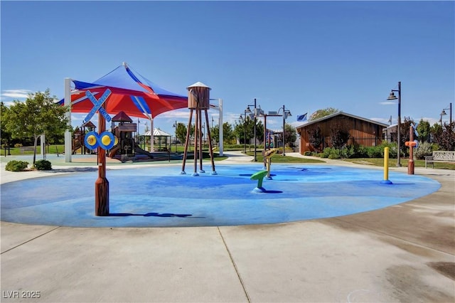 view of community featuring playground community