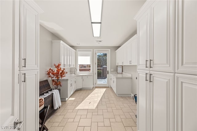 laundry area featuring a sink